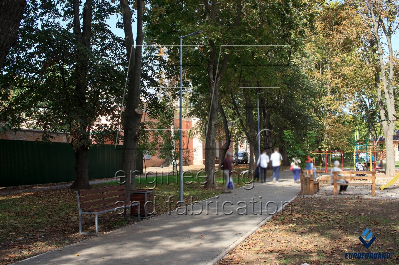 Опори паркового освітлення вздовж доріжки скверу